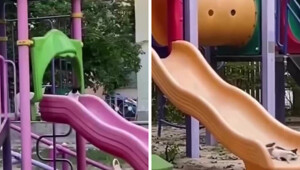 Когда в парке никого нет, маленький котёнок тайком катается с горки