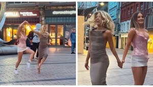 Две девушки синхронно станцевали на площади под музыку уличного музыканта в Ирландии
