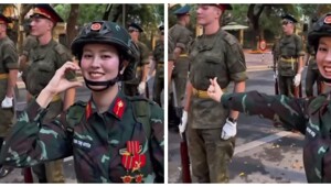 Вьетнамская военнослужащая показала жест сердечко российскому солдату на параде