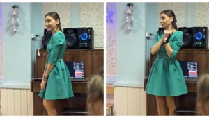 Воспитательница поддерживала детей во время праздничного танца