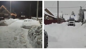 Мужик почистил дорогу около своего дома, а заодно и около примыкающих участков