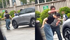 Конфликт на парковке в Китае: женщина ударила охранника, после чего получила ответный удар