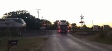 Автовоз с машинами против поезда