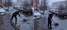 Необычный герой двора: мужчина расчистил ливнёвку лопатой и спас затопленный двор