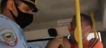 Полицейские скрутили мужчину из-за спущенной на подбородок маски