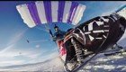Невероятный прыжок на снегоходе с парапланом