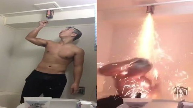 Сумасшедший азиат принимает душ под фейерверком