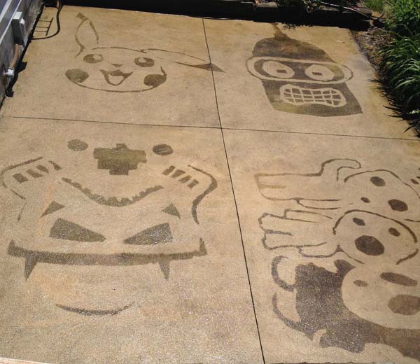 Картины струей воды на бетоне.