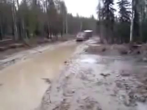 Камаз по очень большой луже 