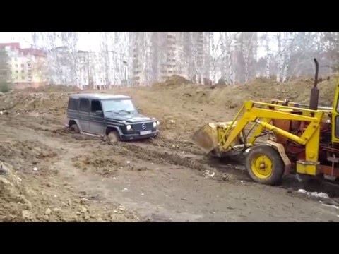 Трактор тянет гелендваген