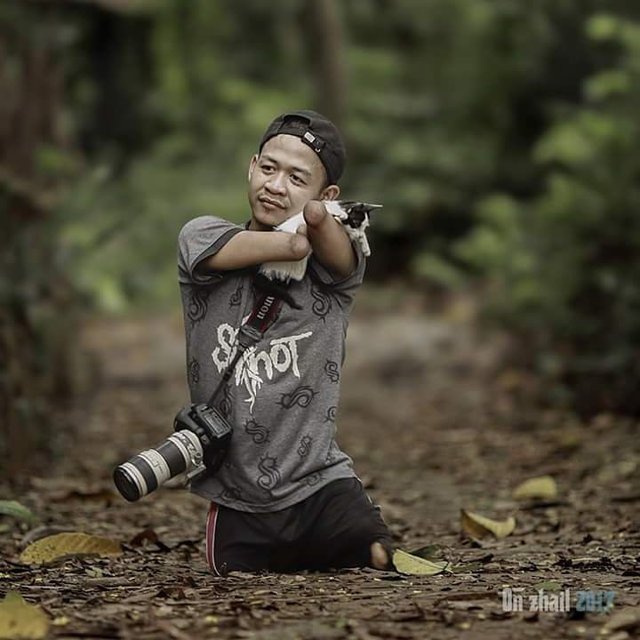 Этот фотограф родился без рук и ног, но его снимки говорят сами за себя