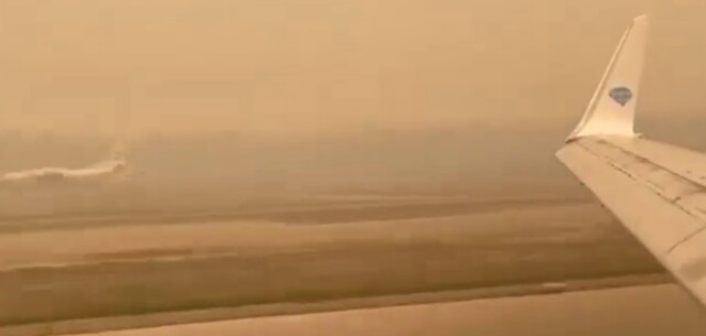 Нет - это не Марс: на видео попала посадка самолёта в аэропорту "Мирный"