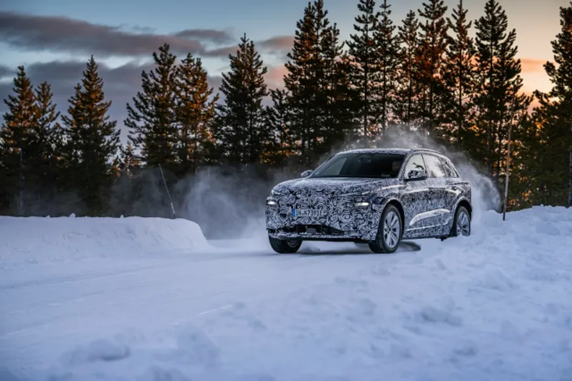 Красивые фото электромобиля Audi Q6 e-tron с испытательного полигона