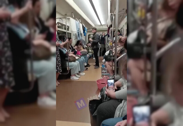 Молодой человек с тазиком развесил белье на поручнях вагона петербургского метро