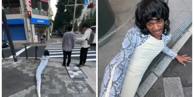 Турист прополз по улицам японского города в костюме змеи