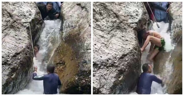 Мужчины спасли мальчика, застрявшего между огромными валунами в бурной реке