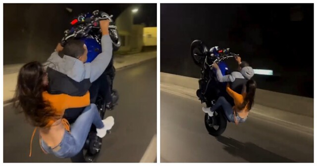 Байкер поднял мотоцикл на дыбы с пассажиркой за спиной