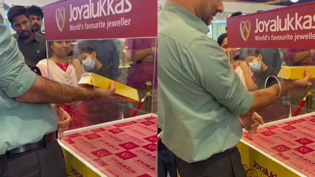 В Дубае мужчина сумел достать золотой слиток из прозрачного куба