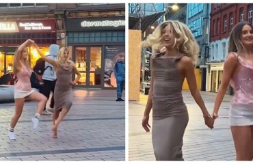 Две девушки синхронно станцевали на площади под музыку уличного музыканта в Ирландии