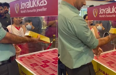 В Дубае мужчина сумел достать золотой слиток из прозрачного куба